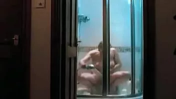 Play Spying on my mom's noisy shower masturbation